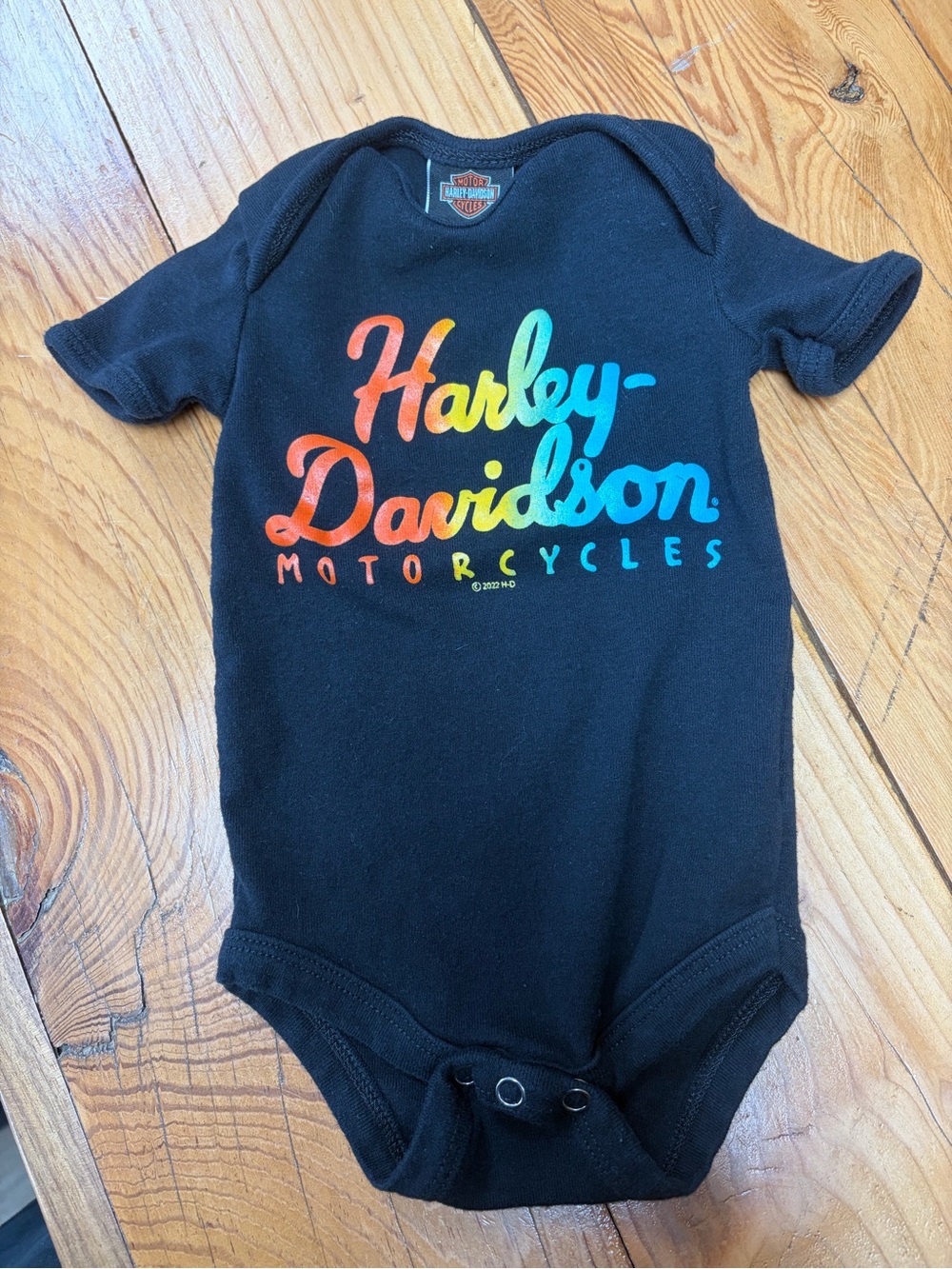 Harley-Davidson Black One-Piece with Rainbow Script 6-9 Mons